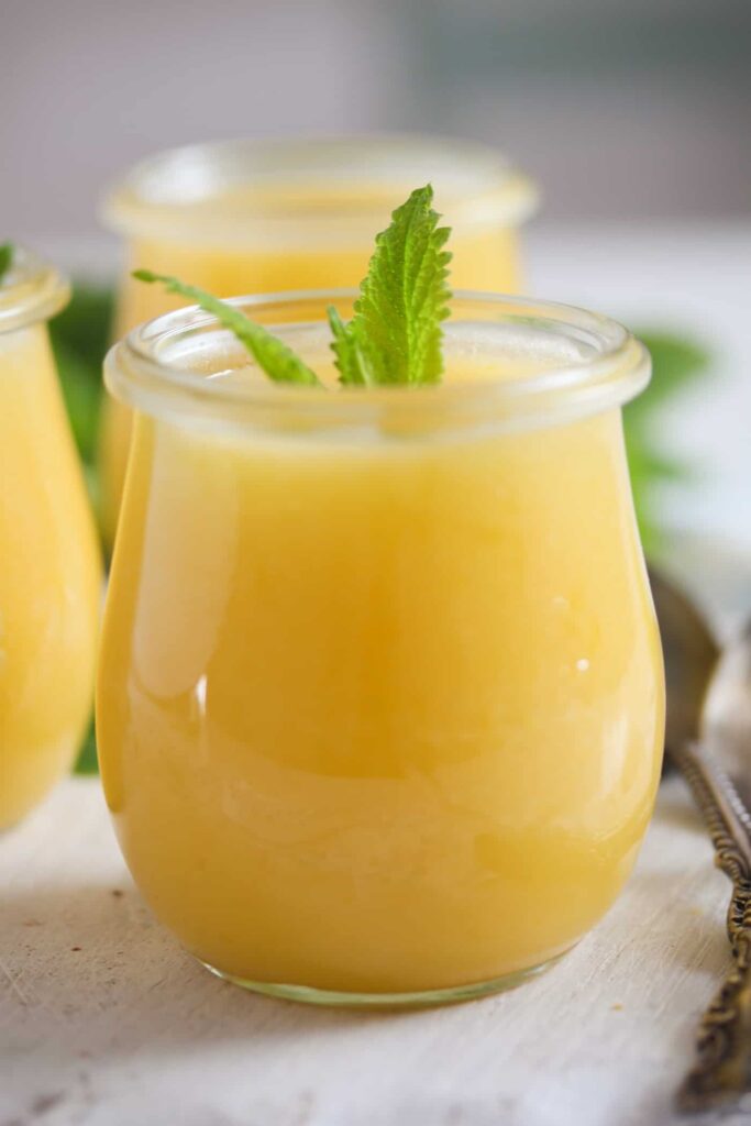 creamy yellow curd in a small jar