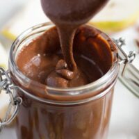 chocolate peanut butter spread falling off the spoon