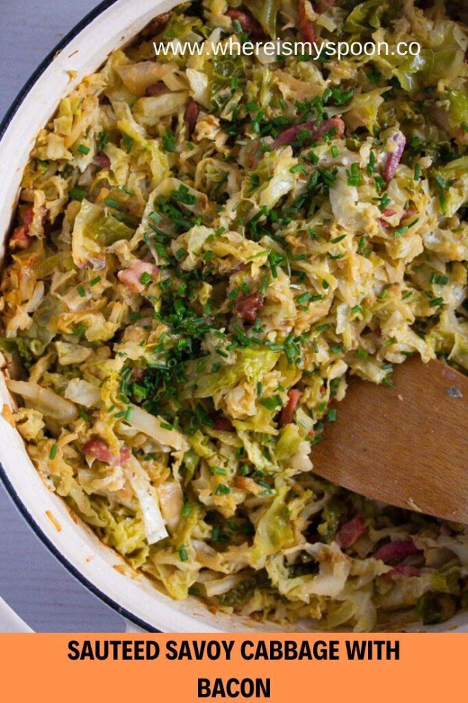 sauteed savoy cabbage with bacon and onions in a skillet