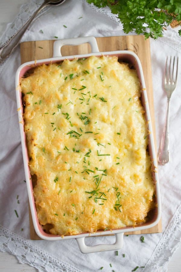 casserole dish with baked cabbage and potatoes