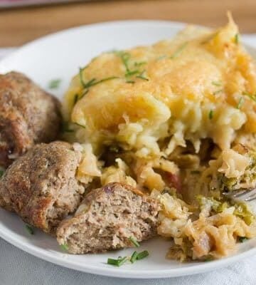 savoy cabbage casserole with meatballs on a plate
