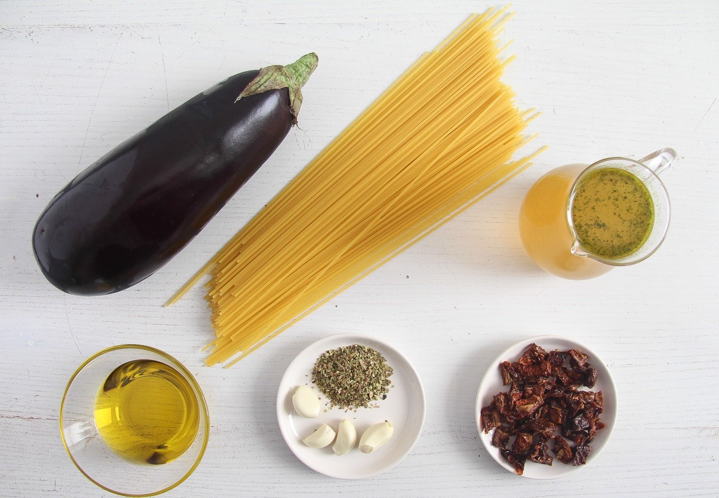 eggplant, dried noodles, oil, stock, garlic and dried tomatoes