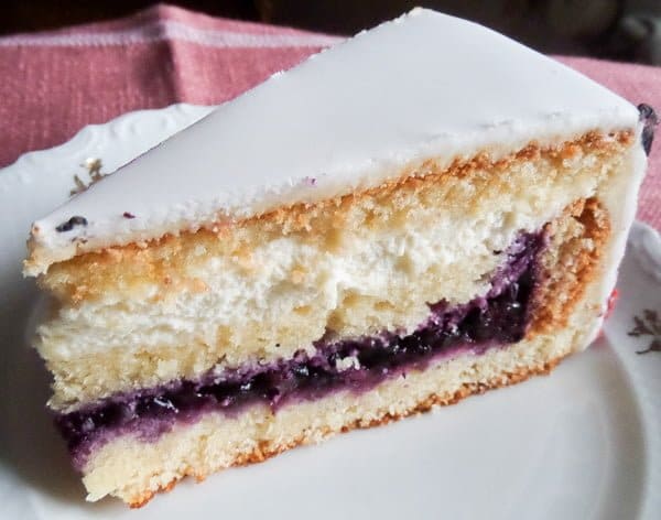 slice of cake with blueberry filling