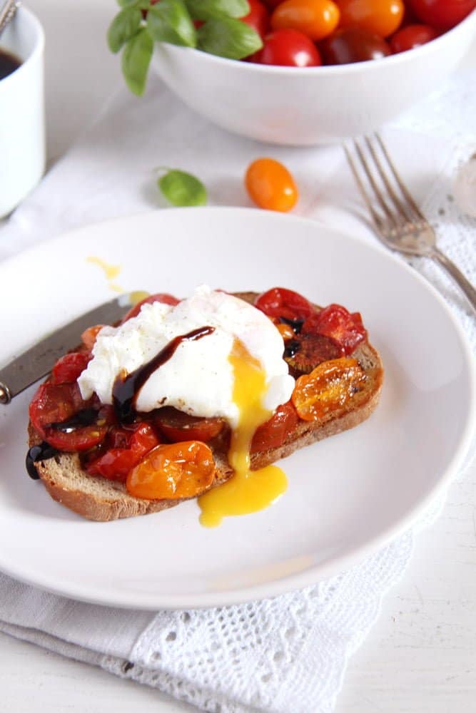 poached egg on roasted tomato toast