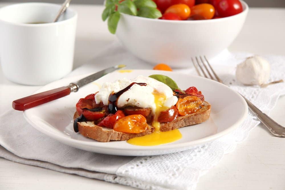 poached egg on roasted tomato toast