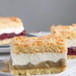 slice of gooseberry cheesecake on a white long platter