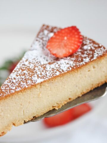 slice of two ingredient cake with strawberries on top