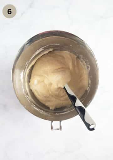 folding egg whites into cake batter with a rubber spatula.