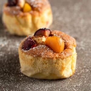 two mini plum clafoutis made after an ottolenghi recipe.