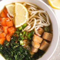 bowl with noodles, tofu and vegetables in broth