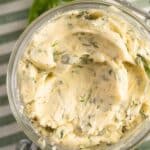 pinterest image with title for garlic and herb butter.