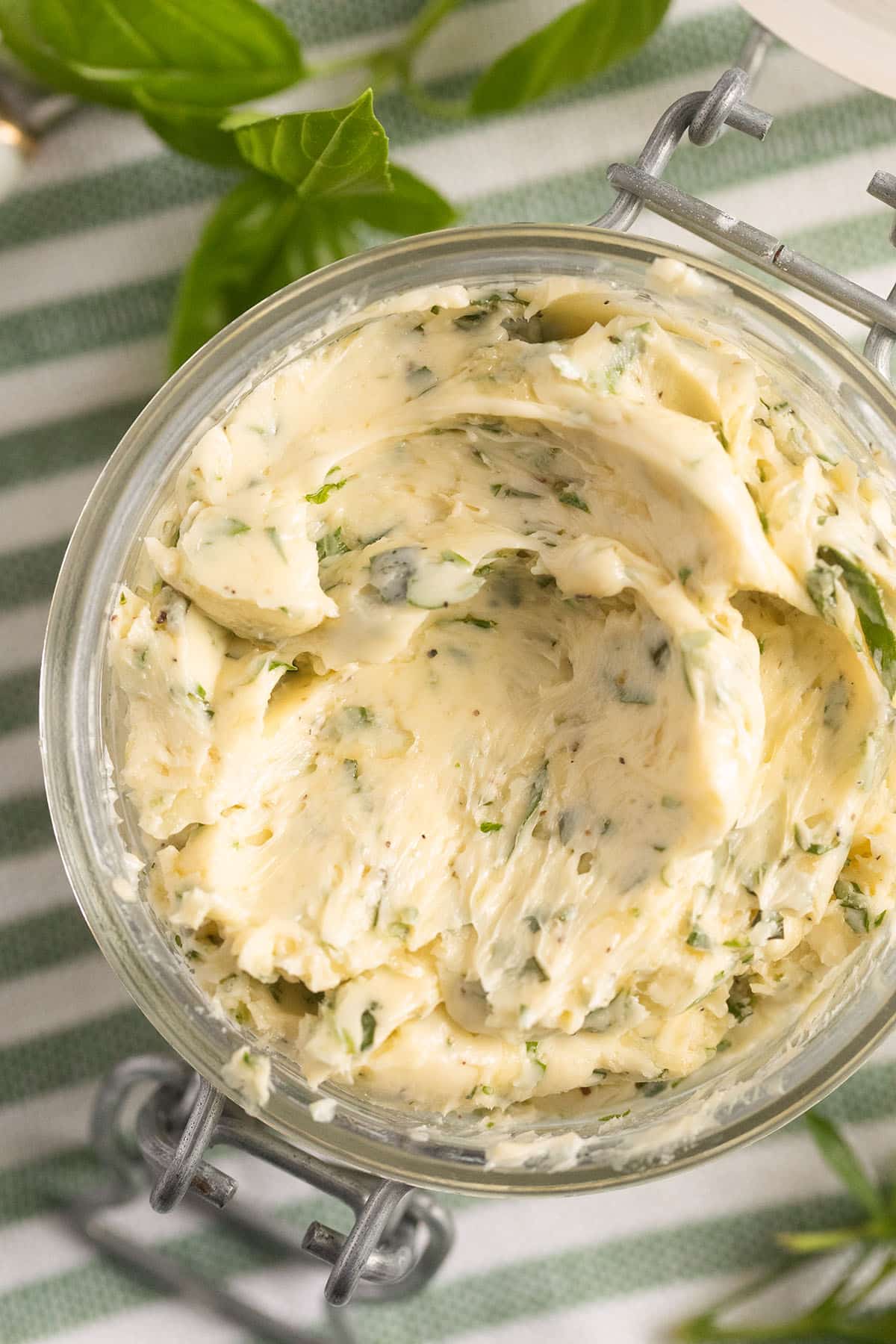 close up of compound butter with garlic and herbs.