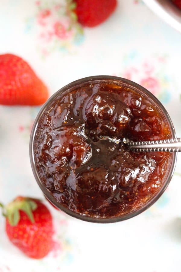 glossy rhubarb strawberry jam in a jar