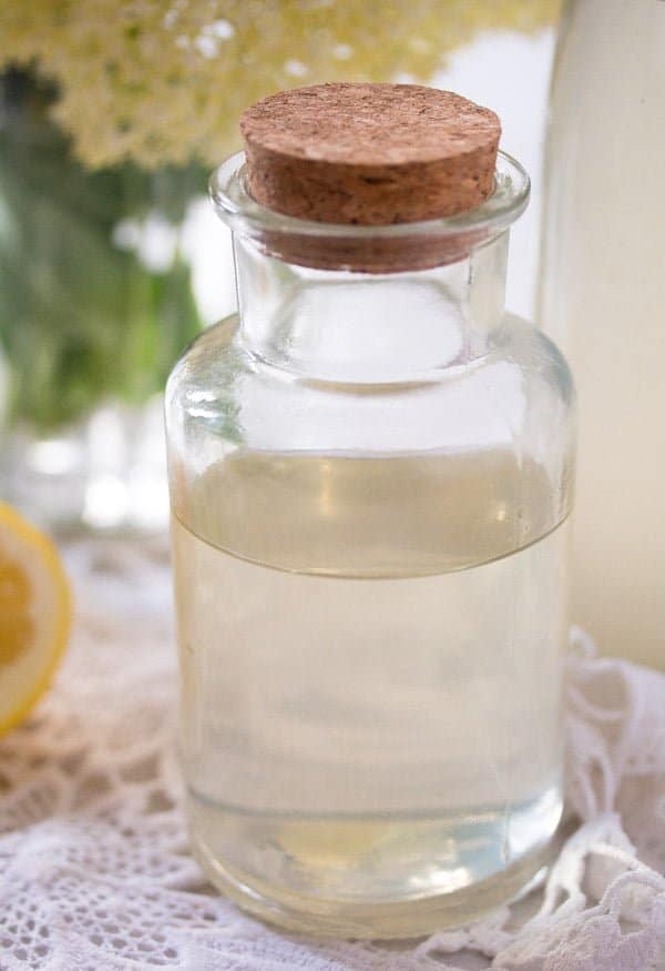 elderflower syrup in a small bottle close up