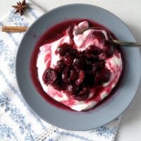 juicy roasted cherries on top of strained yogurt