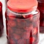 pinterest image with the title preserved cherries.