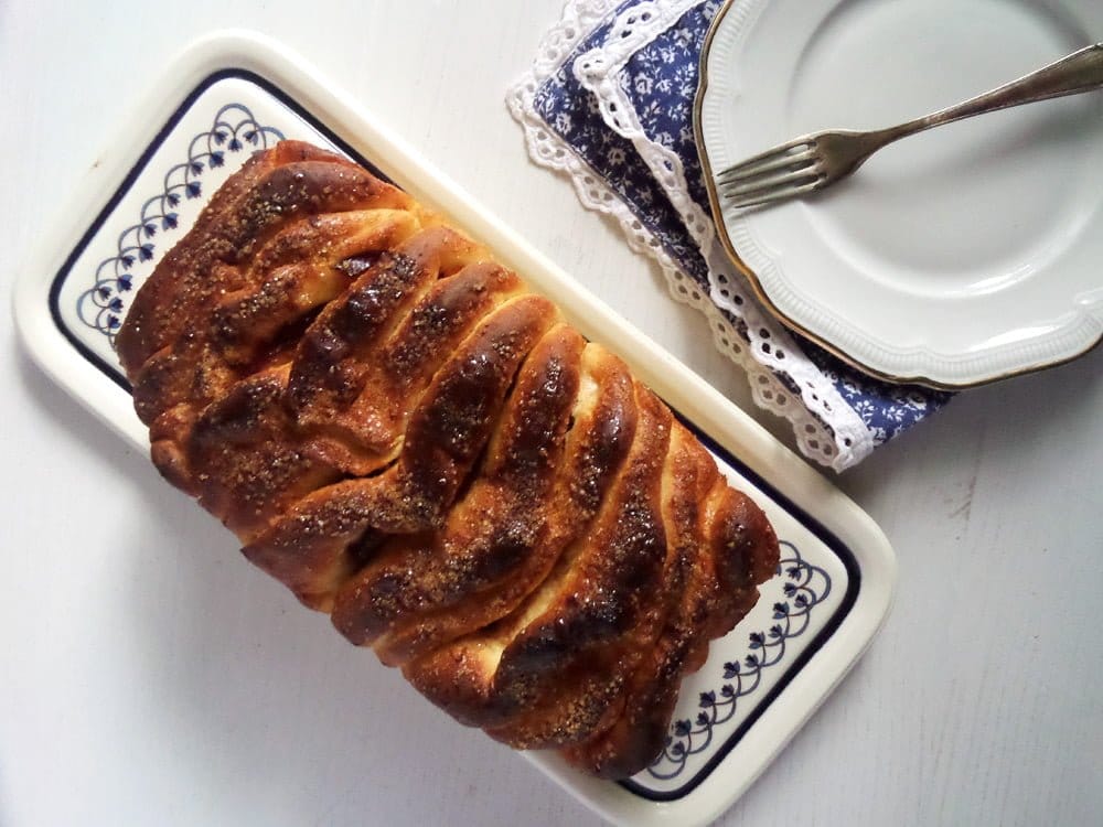 pull apart plum bread on a vintage rectangular serving platter. 