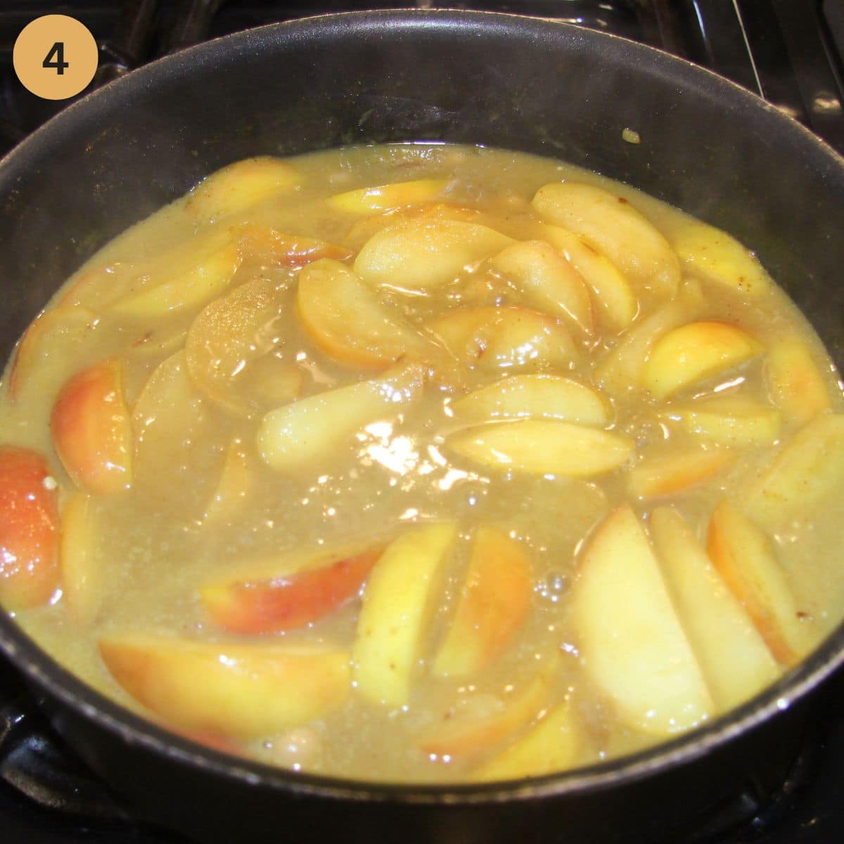 thickening apple curry with cornstarch slurry in a saucepan.