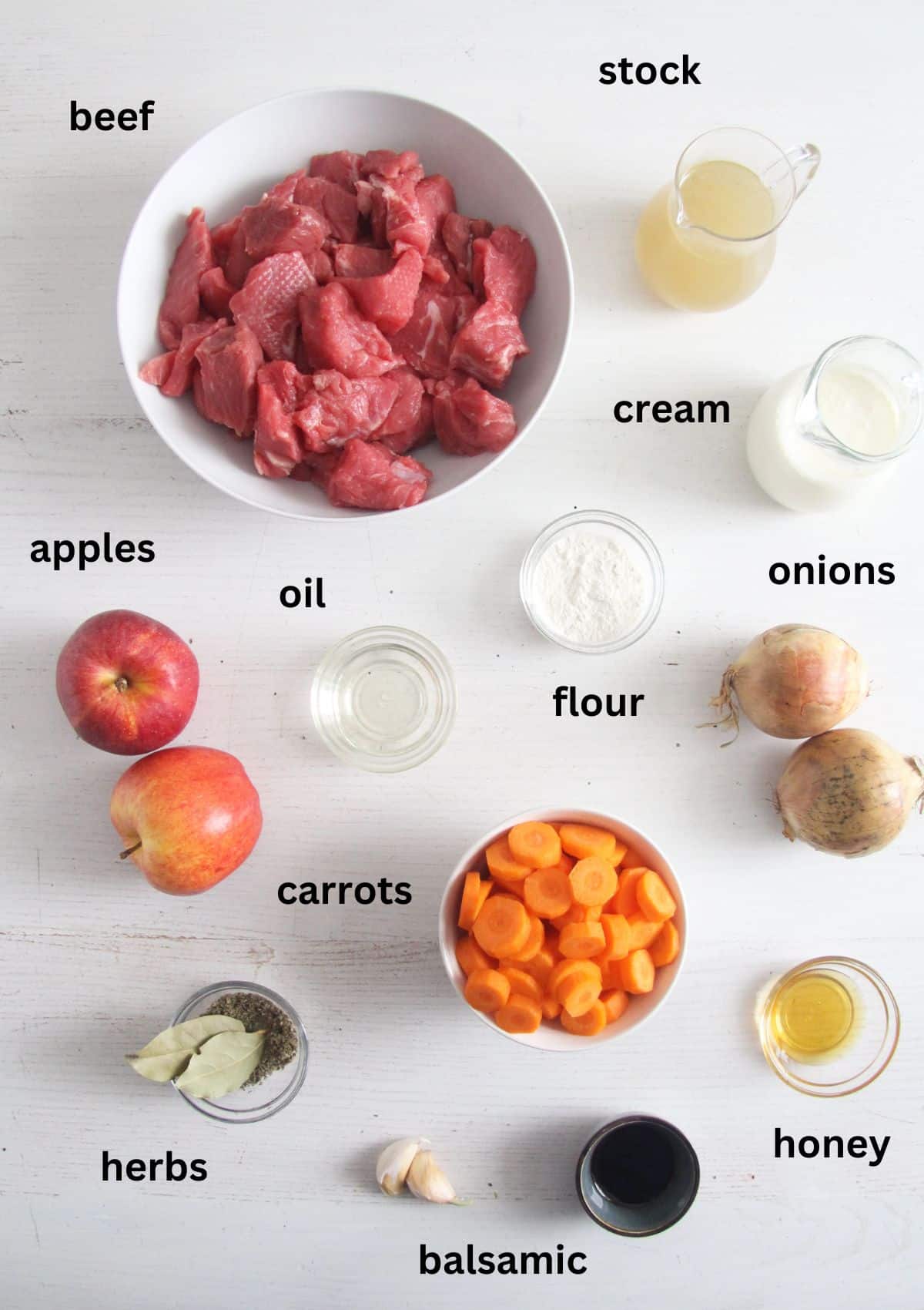 listed ingredients for making stew with beef, apples, and carrots.