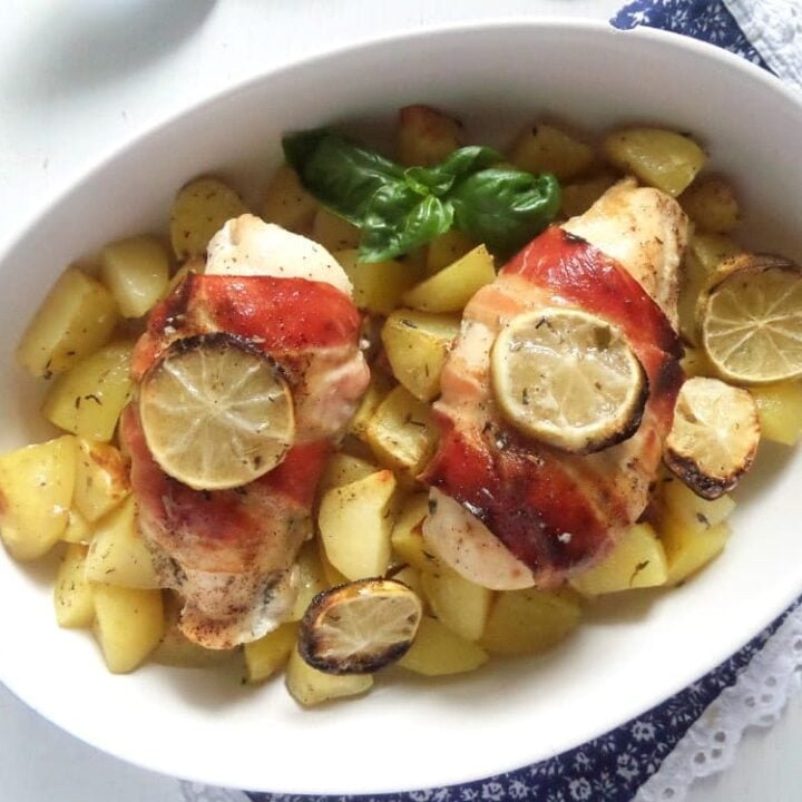 bacon wrapped chicken with herbs and potatoes