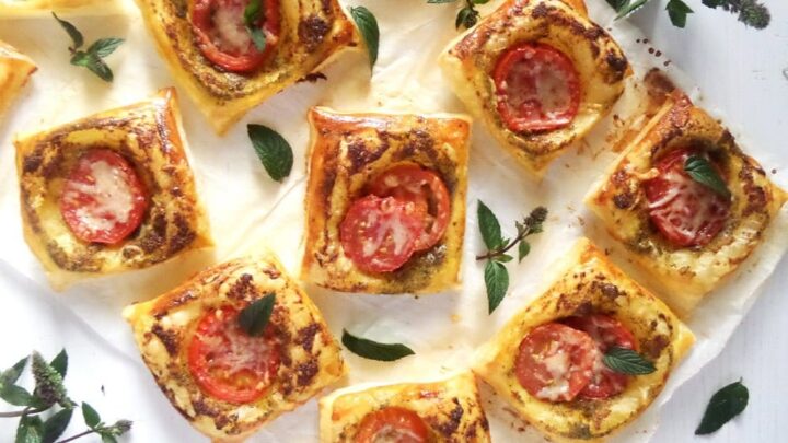 puff pastry party nibbles with mint leaves on the table