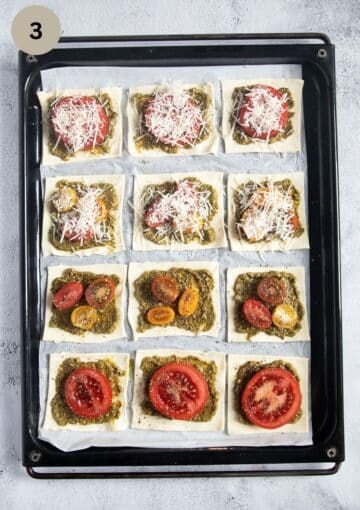 unbaked puff pastry and tomato nibbles on a baking sheet.