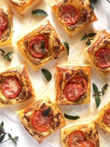 puff pastry nibbles with pesto on the table