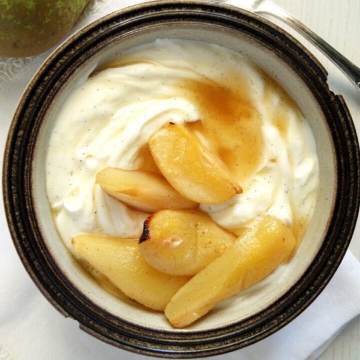 honey pears served on vanilla greek yogurt