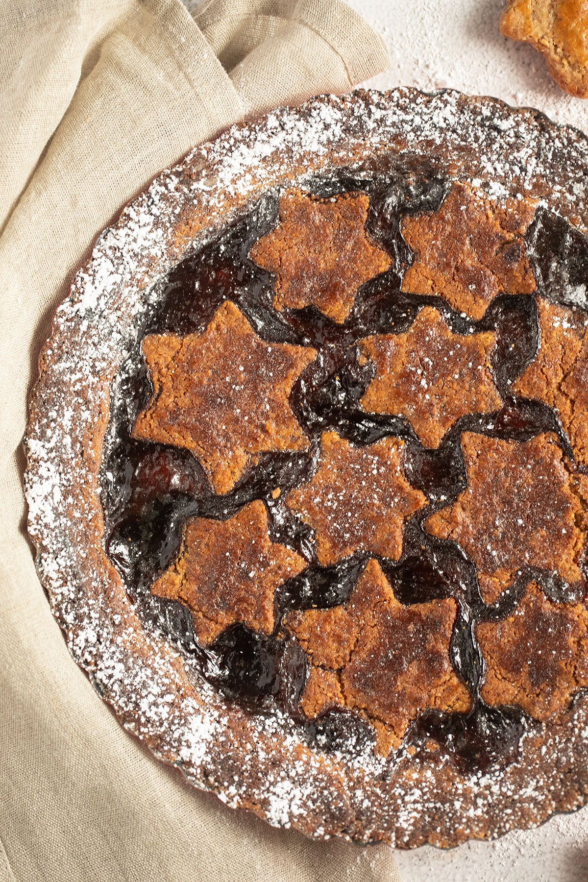 austrian linzer cake with stars on top.