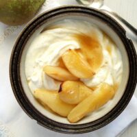 honey pears served on vanilla greek yogurt