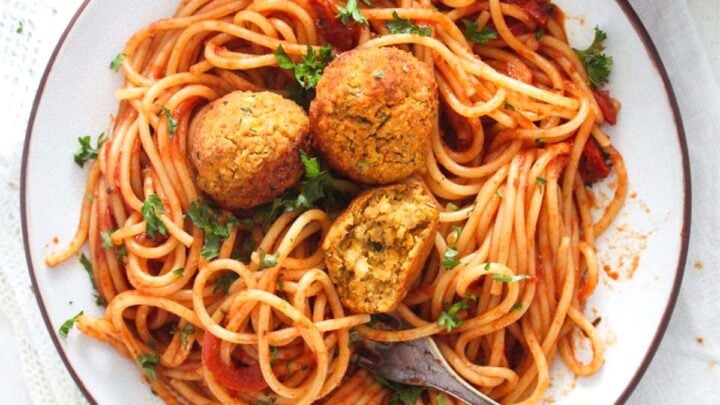 chickpea meatballs served with spaghetti and tomato sauce.