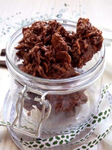 choco crossies in a jar with a ribbon around it.