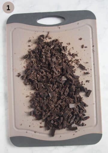 chopped chocolate on a cutting board.
