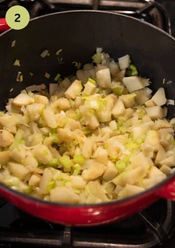 sauteing sunchokes, celeriac, and parsley root cubes in a pot.