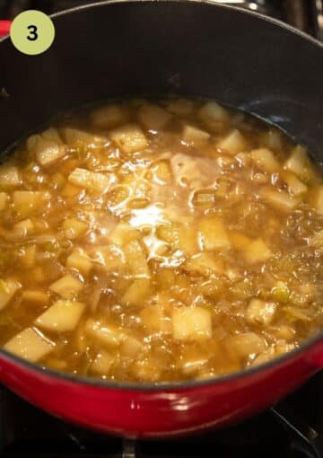 cooked jerusalem artichoke soup before blending in a pot.