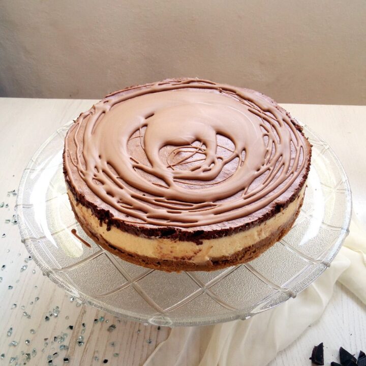 choco mousse cake with white, dark and milk chocolate on a platter
