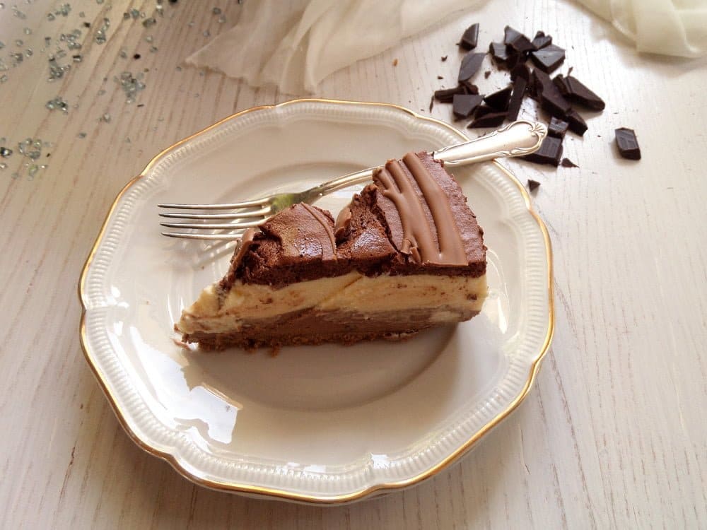 sliced mousse cake on a small vintage plate