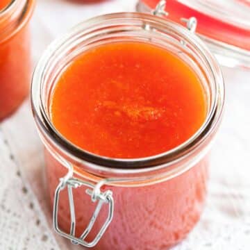 blood orange jam in a small jar.