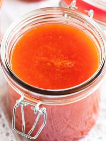 blood orange jam in a small jar.