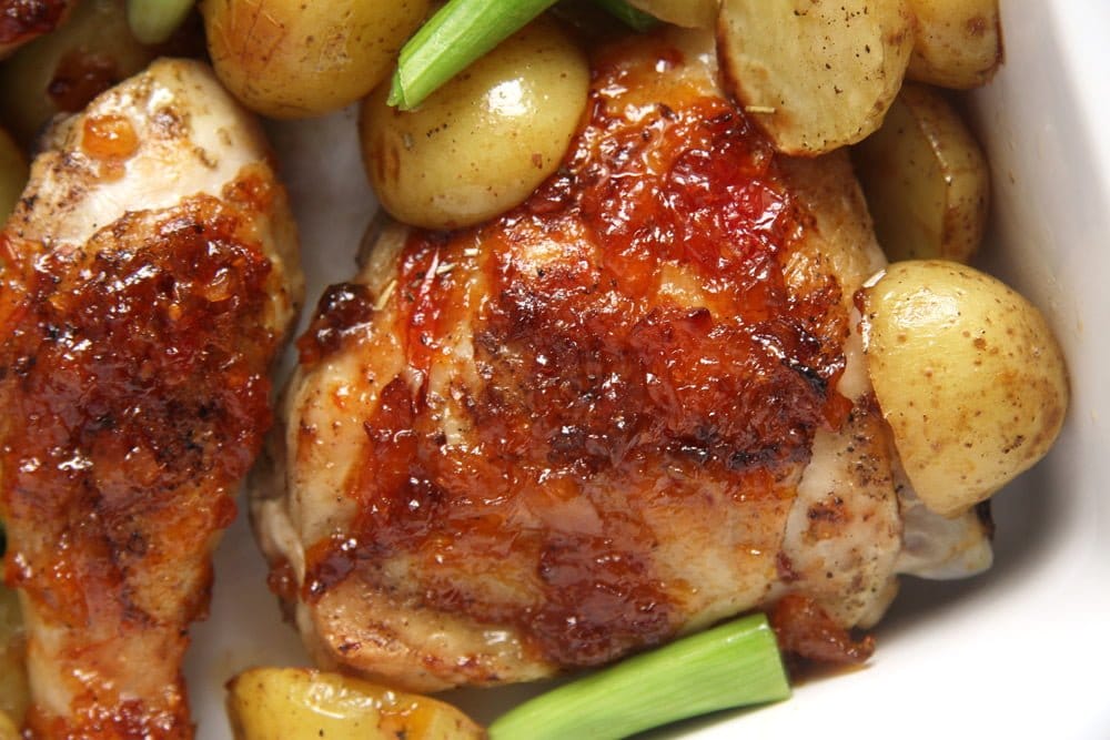 sticky glazed baked mango chicken close up