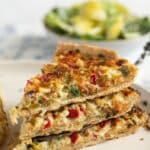 pin image with the title delicious green onions quiche.