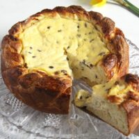romanian cheesecake for Easter sliced on a platter