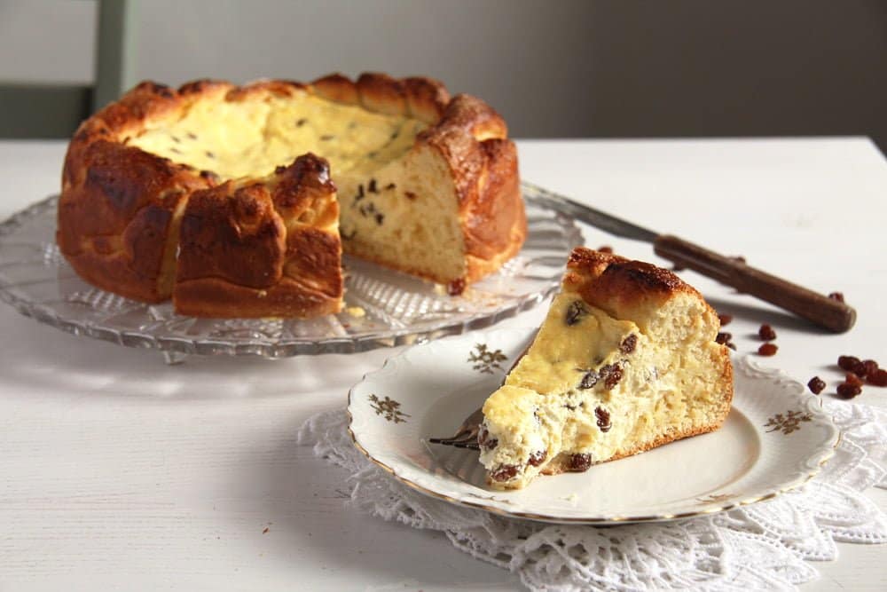 pasca or romanian easter bread sliced on a plate.