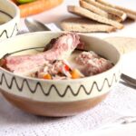 romanian meatball soup in a traditional bowl