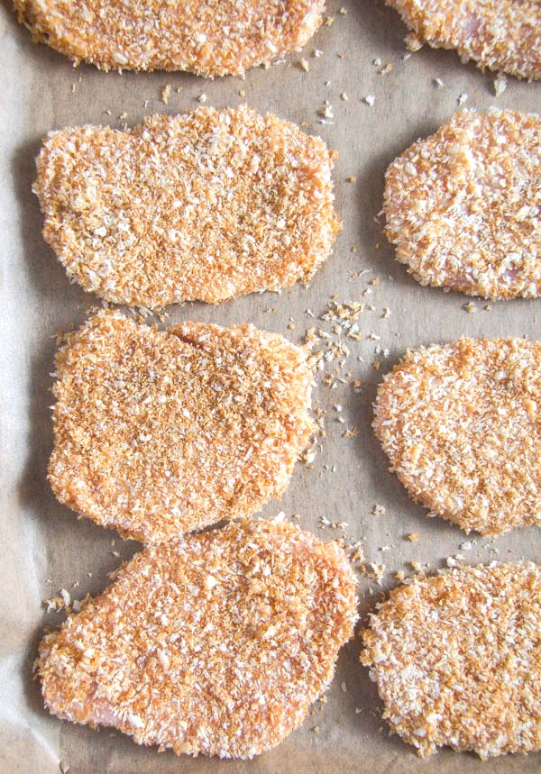 eight pieces breaded meat before cooking