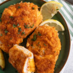 close up cordon bleu schnitzel with potatoes.
