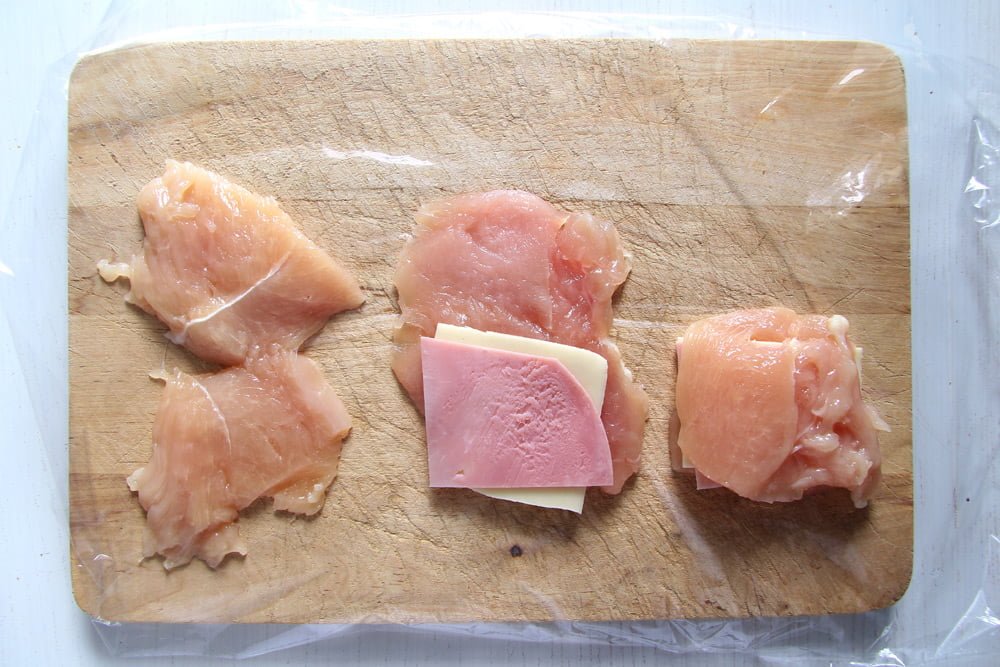 filling chicken breast with ham and cheese