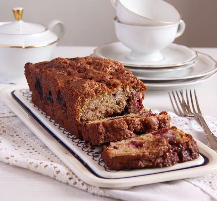sliced rhubarb bread with blackberries