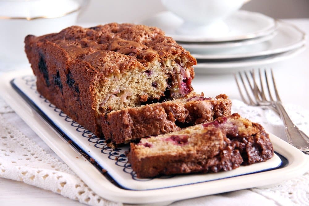 loaf cake with rhubarb and blackberries