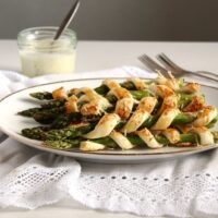 asparagus puff pastry twists on a serving platter